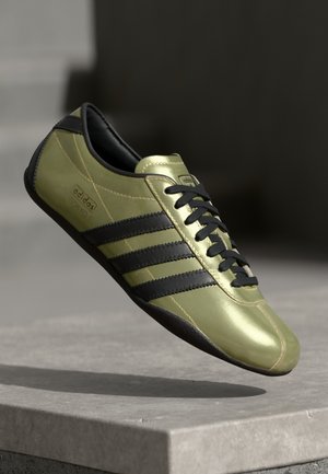 TOKYO - Sneakers laag - gold metallic/core black
