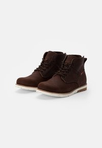 Levi's® JAX - Botines con cordones - dark brown