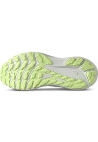 Sohle eines Sneakers mit einer strukturierten weißen Oberseite und einer leuchtend limonengrünen Gummilaufsohle, die ein wellenförmiges Profil für besseren Grip aufweist.