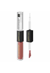 Rossetto liquido in un tubetto trasparente con tappo nero, dotato di un applicatore a cuore. Il colore è un rosa smorzato con finitura lucida.