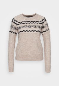 Maglione beige lavorato a maglia con scollo rotondo, caratterizzato da un motivo geometrico bianco e nero sul petto e maniche lunghe con polsini a coste.