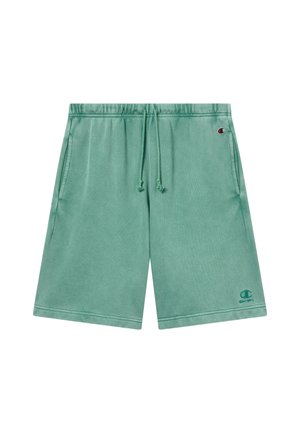 Hellgrüne Baumwollshorts mit Kordelzugbund, seitlichen Taschen und Champion-Logos am linken Bein und auf der oberen rechten Seite.