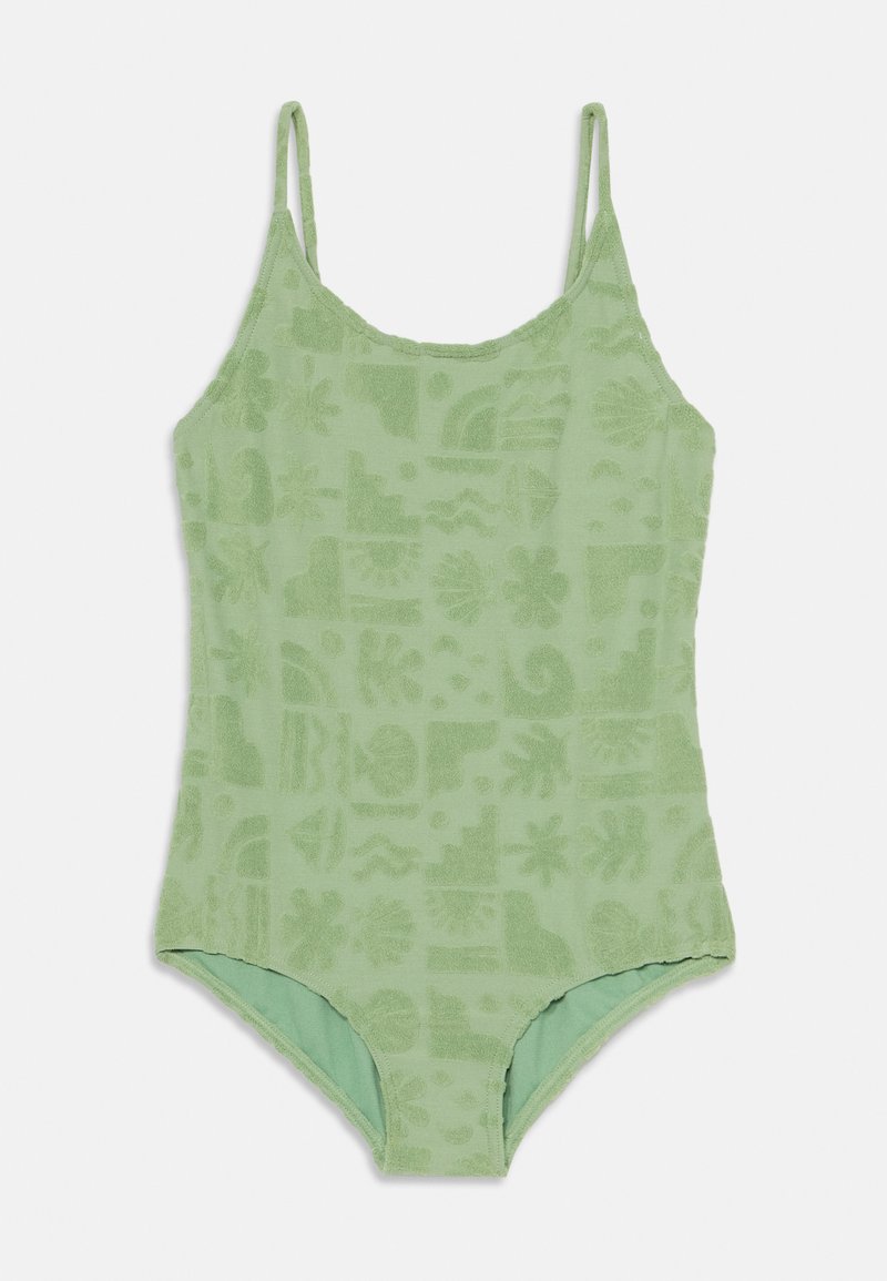 Zaļš frotē peldkostīms ar plānām regulējamām siksnām, kura virsmā ir reljefains tropisko formu un viļņu raksts.