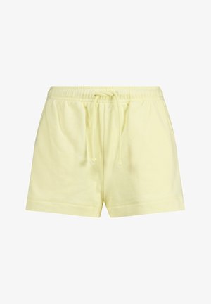 Shorts en coton jaunes avec une taille élastique et un cordon de serrage ajustable, dotés de poches latérales et d'une texture douce.