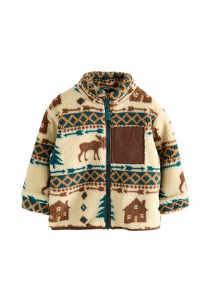 Veste en polaire avec fermeture éclair, poche poitrine marron, et motifs hivernaux d'orignaux, d'arbres et de maisons en marron et sarcelle sur fond crème.
