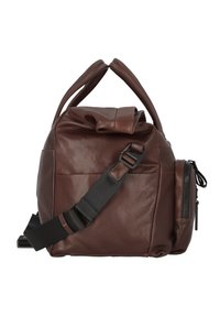 Sac en cuir brun au toucher doux, doté de deux poignées et d'une bandoulière amovible. Comprend une poche zippée sur le côté pour un rangement supplémentaire.