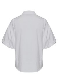 Blouse blanche à manches courtes avec manches larges et bouffantes et un col classique, vue de dos sur un fond uni.