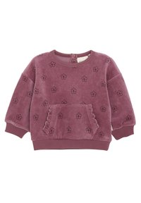 Fleece pullover in stoffige roos met zwart bloemenpatroon, ronde hals, ribgebreide manchetten en een voorzak met gerimpelde randen.