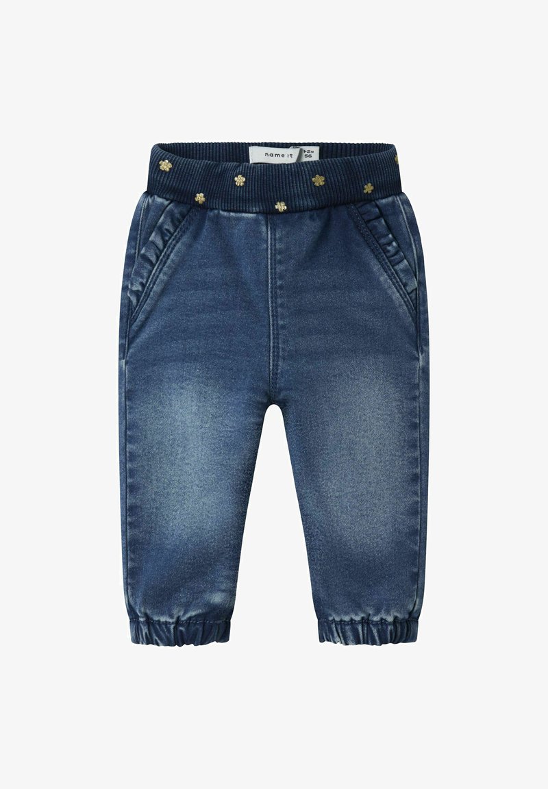 Joggers de denim en azul oscuro con cintura elástica, que presentan acentos florales dorados, bolsillos laterales y puños fruncidos.
