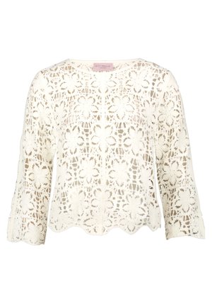 Biała koronkowa bluzka z kwiatowym wzorem na szydełku, z rękawami o długości 3/4 i falowanym dołem, zdobiona misternymi, ażurowymi kwiatowymi wzorami na całej powierzchni.