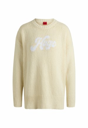 Light cream knitted sweater with a round neck, featuring a textured finish and a white "Hugo" logo prominently displayed on the front.