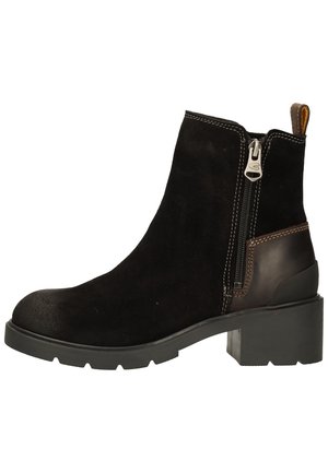 Black suede ankle boot with a side zipper, brown leather accents, and a rugged sole. Features a block heel and stitching details.