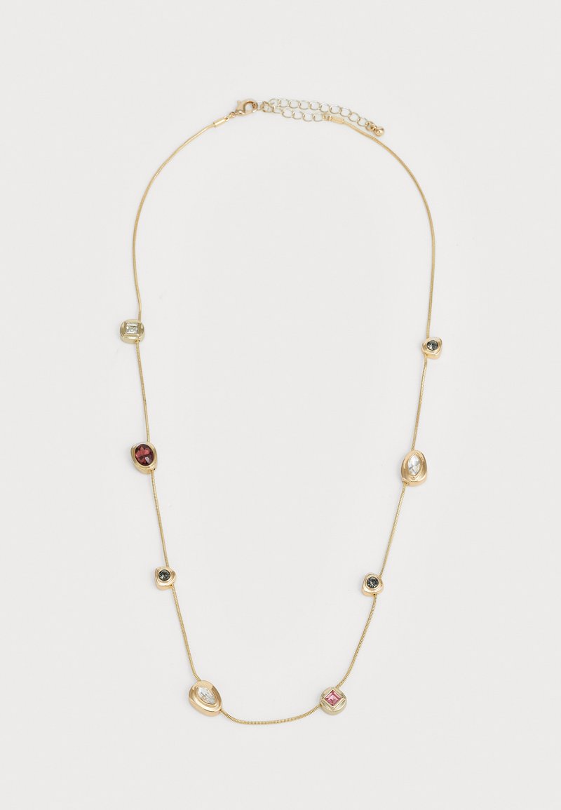 Zarte Goldkette mit sieben unregelmäßig geformten Edelsteinfassungen in Rot, Klar und Dunkelgrau, gleichmäßig entlang der Kette verteilt.