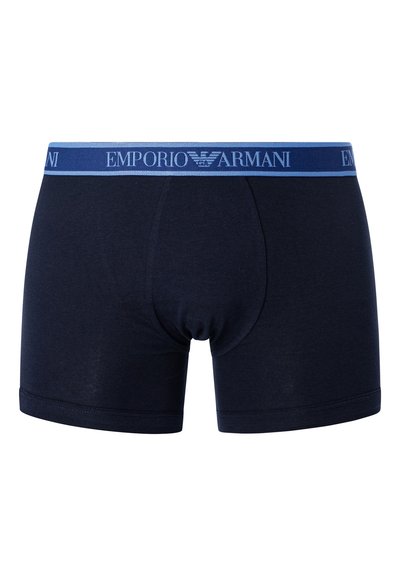 Navy blue boxer briefs made of soft fabric. Features elastic waistband with "Emporio Armani" logo. Fitted design and smooth texture.