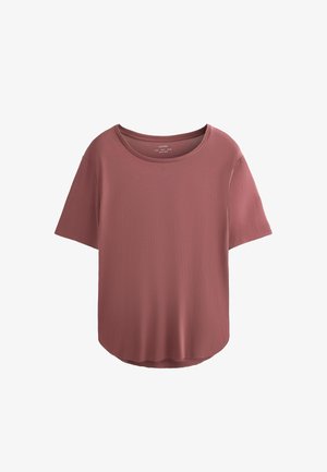 Majica s kratkimi rokavi v barvi prašenega rožnatega, narejena iz mehkega materiala, z okroglim ovratnikom in rahlo ukrivljenim robom na dnu.