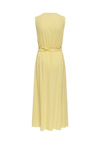 Robe midi jaune pâle sans manches avec taille élastiquée et jupe fluide, vue de dos sur fond blanc.