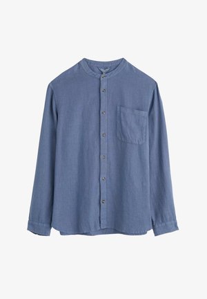 Világoskék, hosszú ujjú ing, kerek gallérral, elől gombos záródással és mellzsebbel. Simává szőtt anyagból készült, laza fazonú.