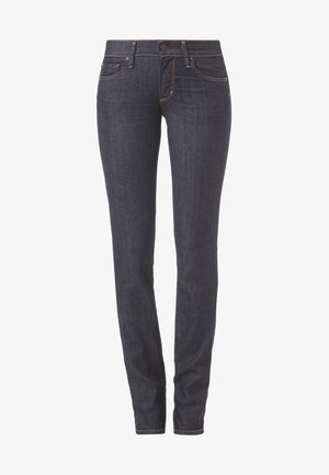 Ciemnoniebieskie dżinsy o slim fit, z pięcioma kieszeniami, subtelnymi przeszyciami oraz zapięciem na guzik w talii.