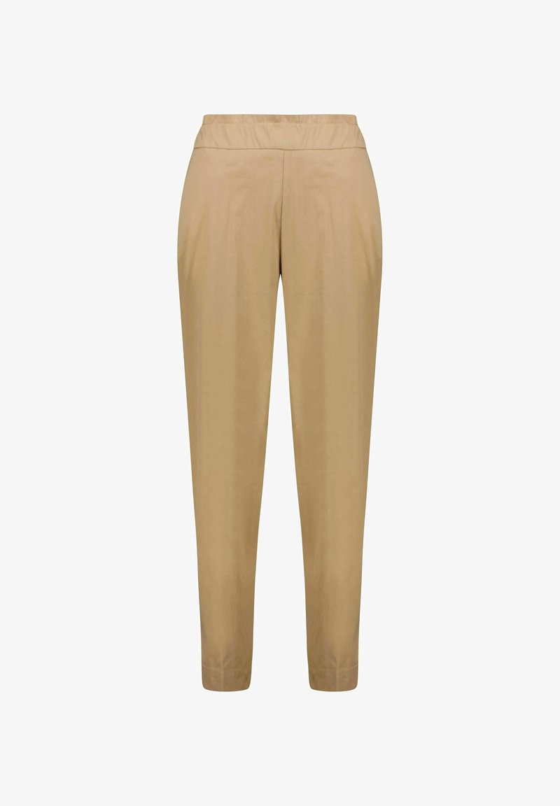 Beige Hosen mit elastischem Bund, schmal zulaufendem Bein, glatter Textur und minimalen Nähten, geeignet für die Freizeit.