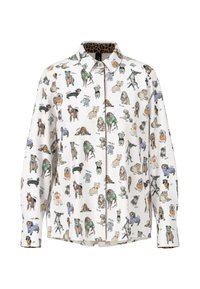 White shirt featuring an all-over pattern of various dogs, button-up front, and a leopard print inside collar. Fabric texture is smooth.