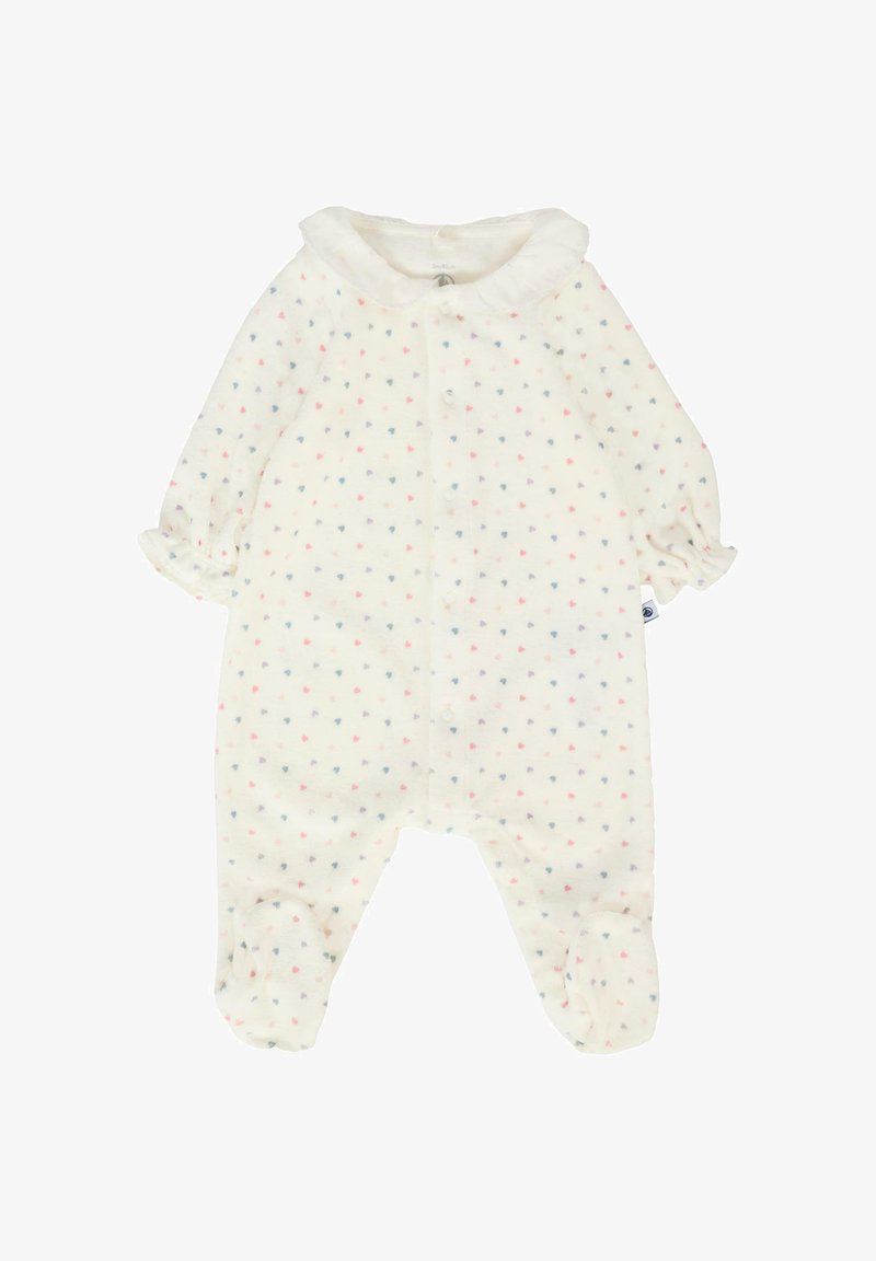 Tutina in pile bianco con motivo a cuori multicolori, polsini elastici e colletto rotondo, dotata di chiusura a bottoni sul davanti.