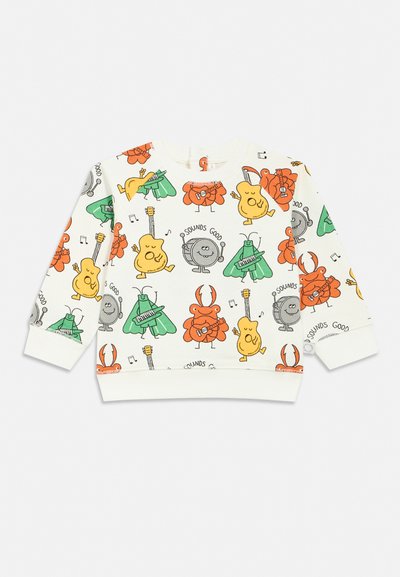 Λευκό παιδικό φούτερ με μακριά μανίκια με πολύχρωμα καρτούν ζώα που παίζουν διάφορα μουσικά όργανα και νότες τυπωμένες παντού.