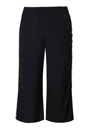 Černé široké kalhoty s elastickým pasem a hnědým zubatým lemováním podél vnějších bočních švů.