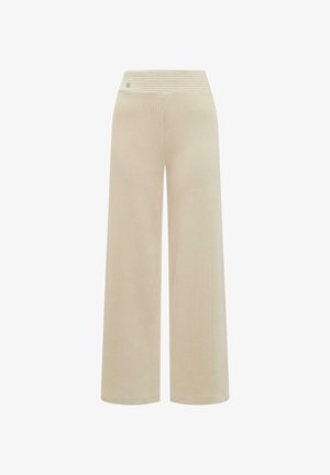 Beige wide-leg ribbed trousers with a high, textured waistband and a small metallic logo detail near the top left side.