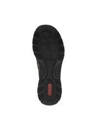 Semelle de chaussure en caoutchouc noir avec divers motifs texturés et un logo rouge. La forme est standard ; comprend des crampons pour une adhérence optimale.