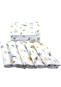 Set van zeven katoenen mousseline doeken, wit met kleurrijke patronen van bomen, bladeren en kleine dieren in pastelgroen, geel en zwart.