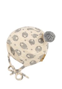 Cream-colored baby hat with gray sheep patterns, ear flaps, tie straps, and a gray pom-pom on top.