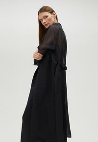 LOLA CASADEMUNT Kišni ogrtač - black