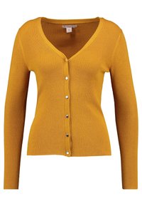 Gul ribbad kofta med långa ärmar, V-ringning och silverfärgad knappar framtill. Tyget har en mjuk, texturerad yta.