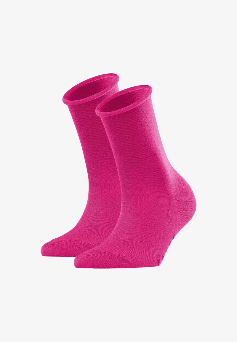 Helle pinke Knöchelsocken aus weichem, dehnbarem Material mit einem gerippten Bündchen und verstärkter Zehenpartie, die eine glatte Oberfläche und keine sichtbaren Muster aufweisen.