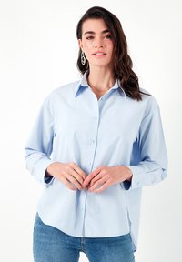 Bluza s gumbima - light blue