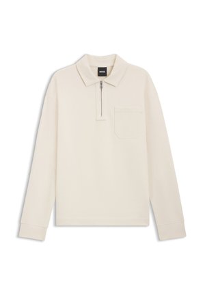 Langärmeliges Poloshirt in Cremefarben mit einem Reißverschluss am Kragen, einer Brusttasche und gerippten Bündchen. Hergestellt aus weichem Stoff, zeichnet es sich durch klare Linien und ein minimalistisches Design aus.