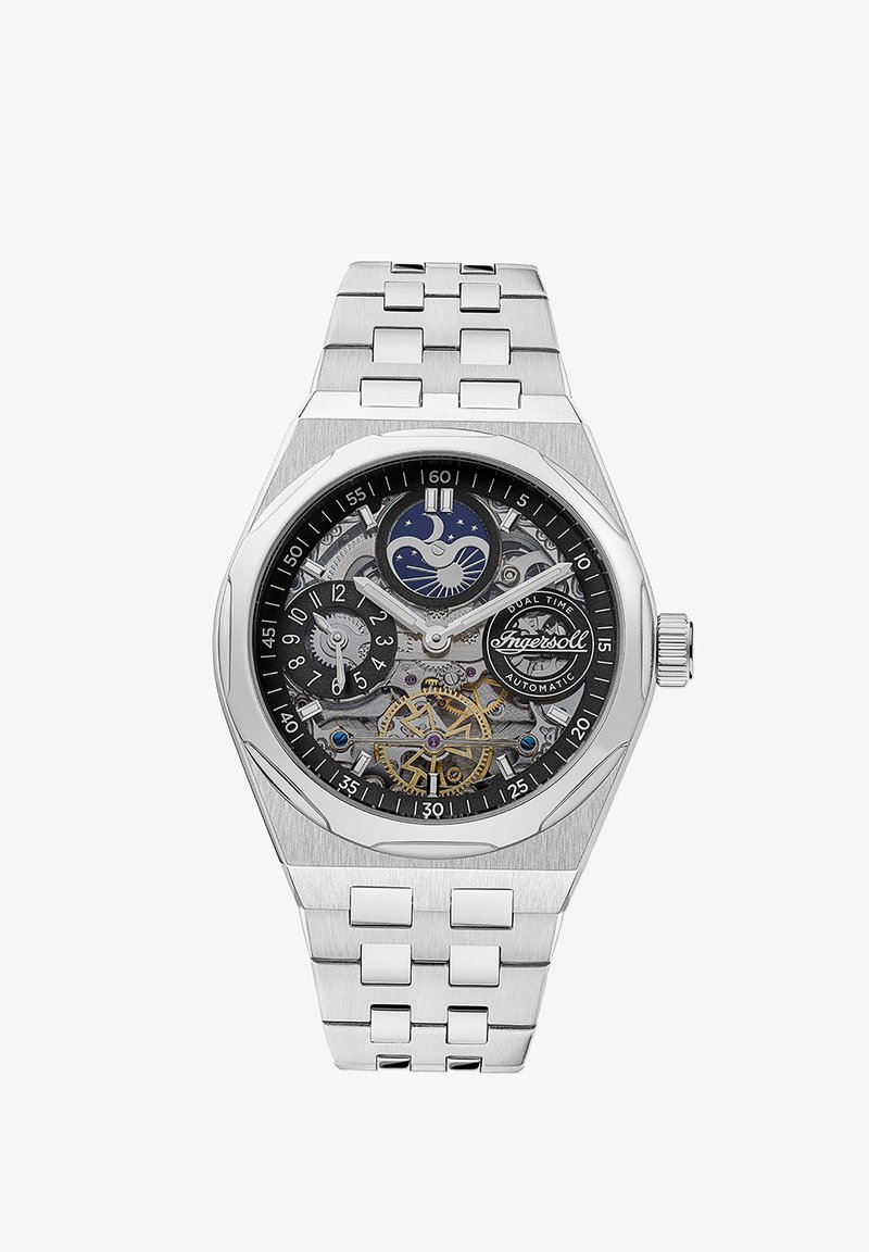 Zilveren roestvrijstalen horloge met zwarte wijzerplaat, open ontwerp dat de mechaniek laat zien, dubbele tijdsaanduiding en gedurfde markeringen.