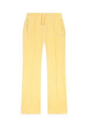 Pantalon de survêtement jaune à jambes droites avec taille élastique, cordon de serrage, poches latérales zippées et détail subtilement cousu sur les jambes.