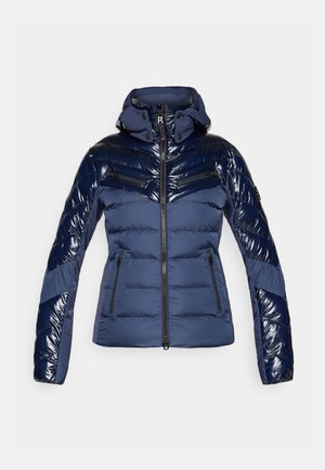 Navy blue padded jacket with shiny fabric accents, front zip, four zippered pockets, and an attached high collar hood.