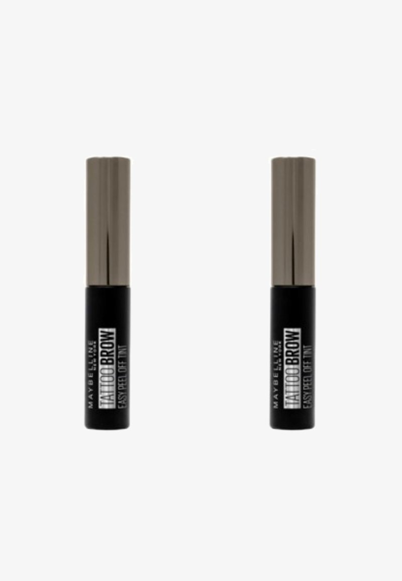Teinture Maybelline Tattoo Brow Easy Peel Off dans un tube noir avec un capuchon argenté brillant, comportant un texte blanc audacieux et une forme cylindrique.