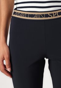 Marc Cain Leggingek - Nadrágok - dark blue