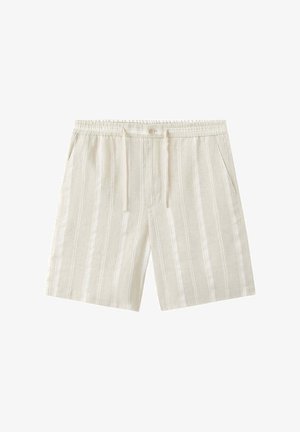 Short beige et blanc à rayures verticales, taille à cordon, fermeture par bouton et poches latérales.