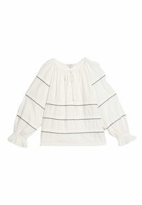 Blusa bianca con maniche lunghe e ampie, con polsini elastici. Presenta righe orizzontali nere e un collo con stringa. Tessuto a trama.