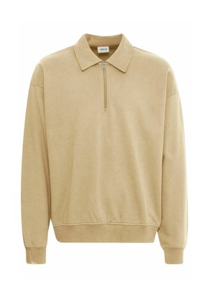 Beige pullover with a zippered collar, ribbed cuffs, and a relaxed fit. Made from soft fabric with a smooth texture. Simple design, no patterns.