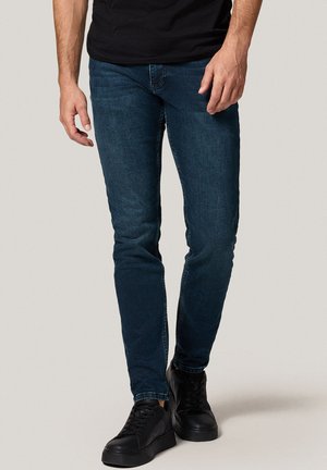 - Jeansy Slim Fit