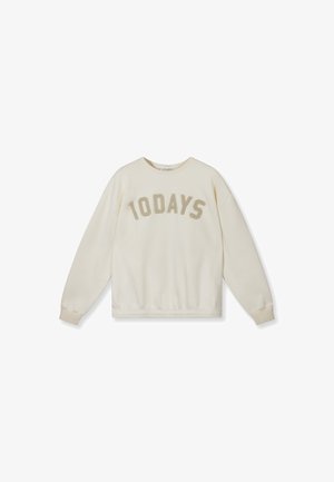 Sudadera de manga larga color crema con puños acanalados y la palabra "10DAYS" impresa en letras mayúsculas grandes en el pecho.