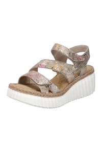 Sandales compensées à lanières avec une finition métallique, présentant trois lanières croisées, une plateforme en jute et une semelle blanche texturée.