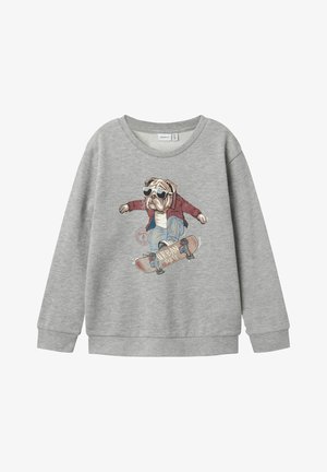 Sweat-shirt gris à manches longues avec un dessin d'un bouledogue portant des lunettes de soleil et une veste, faisant du skateboard avec "Urban Skate" sur la planche.