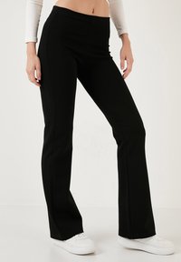 SLIM FIT - Stoffhose - black