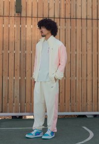 Nike Performance ICON PANT  - Træningsbukser - coconut milk/washed coral/black